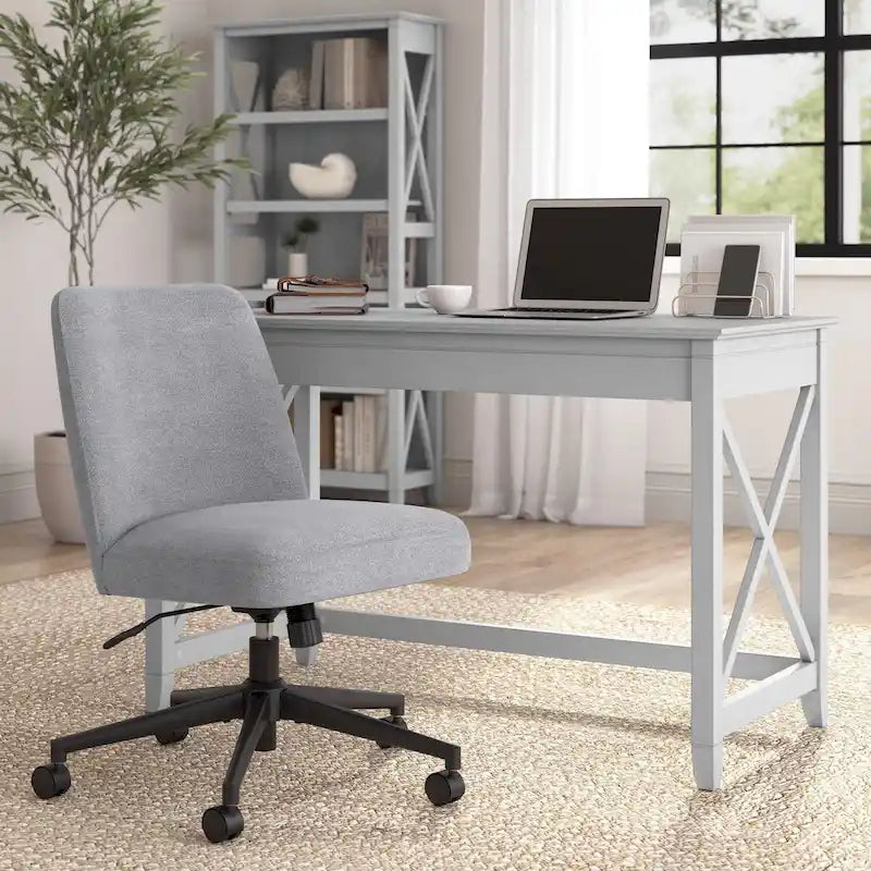 Chaise de bureau sans accoudoirs à roulettes, dossier mi-haut